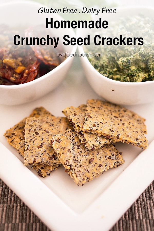 These crunchy homemade seed crackers are quick and easy to make with only a handful of ingredients. These crackers go perfectly with your favourite dip, pesto or can be enjoyed with your favourite topping as a healthy snack. #crackers #glutenfreebaking #glutenfreerecipes #glutenfree #healthyrecipes #lunchboxideas #healthykids #healthykidssnack