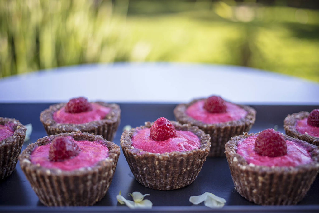 Raw Rasperrby Tarts with a Cacao Nut Base - Delcious and full of flavour, so easy to make. Gluten Free, Vegan, & Refined Sugar Free.