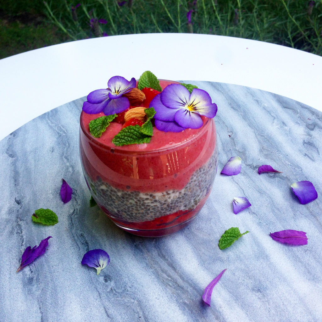 A delicious antixoidant rich layed smoothie with a creamy chia coconut layer, strawberries and acai berries.