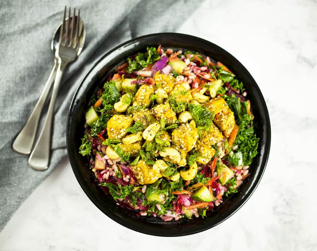 Tempeh Salad rice bowl with cutlery