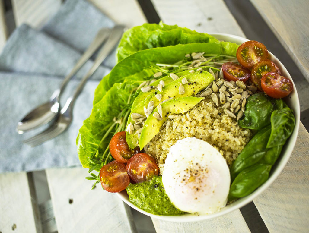 Quinoa Breakfast Bowl with Poached Eggs & Pesto