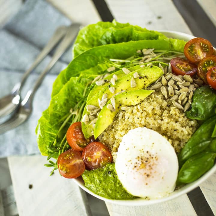 Quinoa Breakfast Bowl with Poached Egg, Avocado & Pesto. A delicious gluten free breakfast that will get you going for the day! Gluten Free, Dairy Free, Vegetarian.