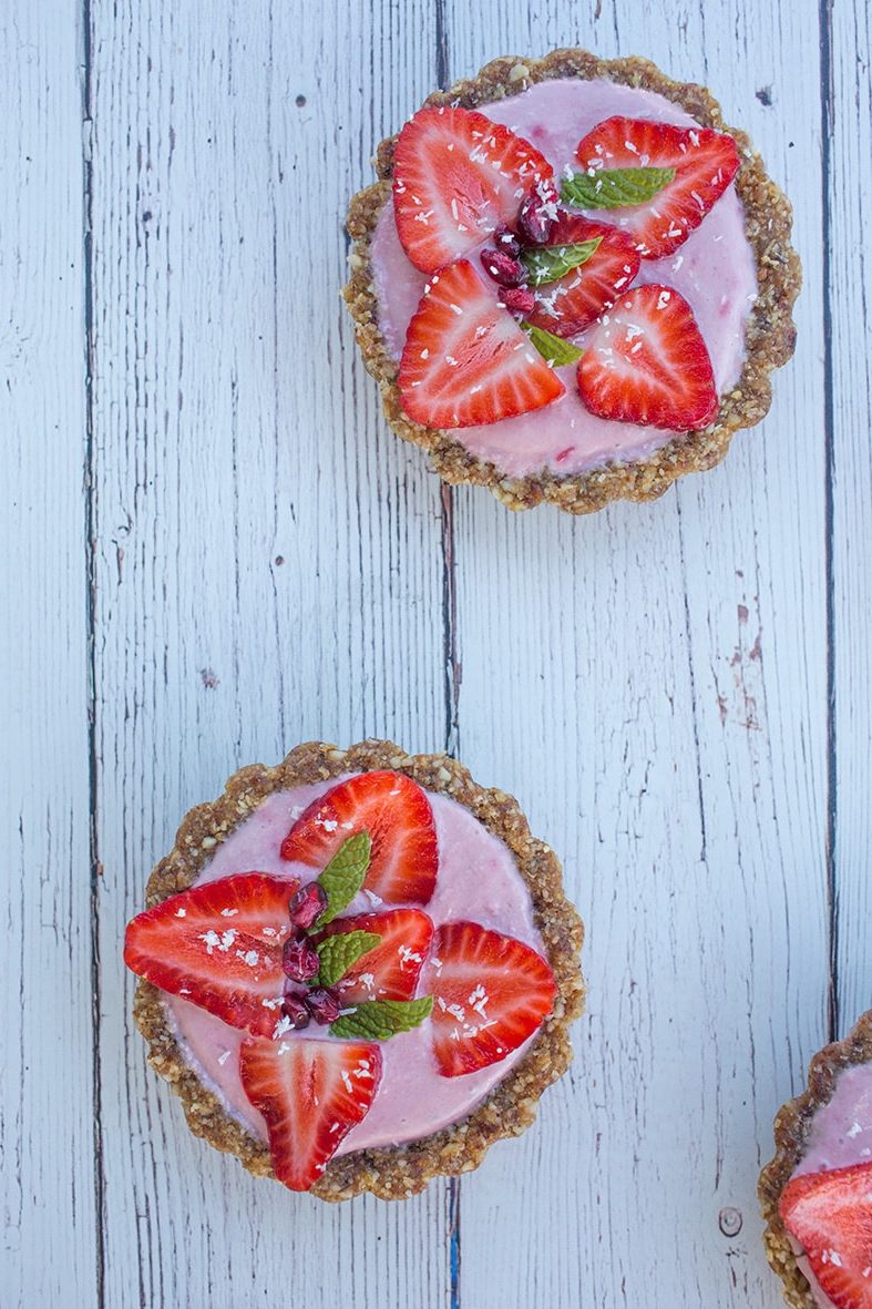 Mini Strawberry Tarts on White Wooden Background