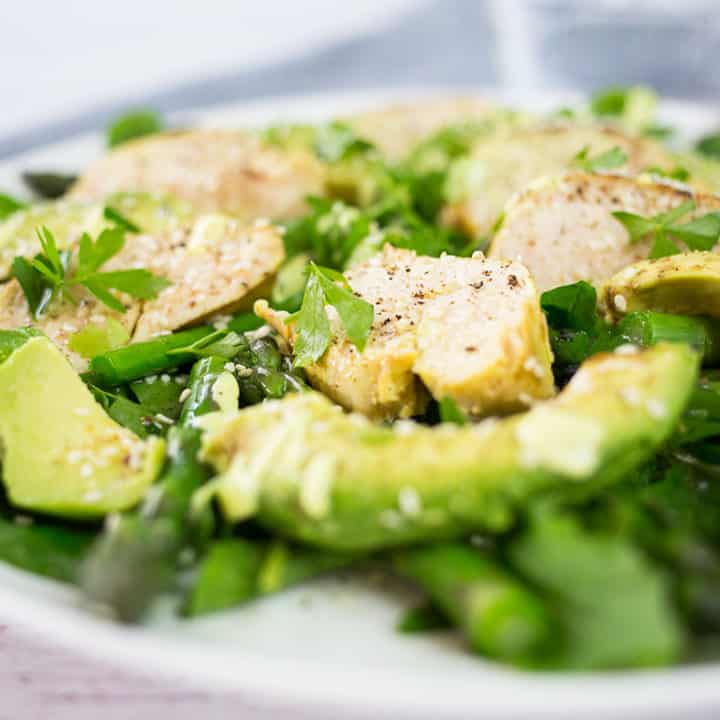 Chicken & Avocado Salad close up with glass of water