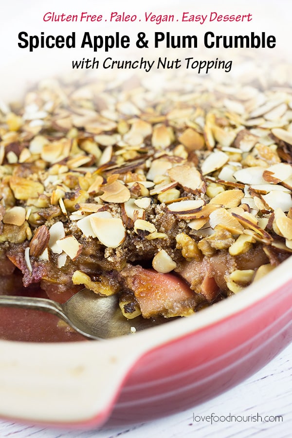 Apple and Plum Paleo Crumble - A tasty apple crumble with spiced apples and plums with a crunchy nut topping. You will love this easy dessert that is the perfect comfort food and a gluten free and paleo version of the traditional crumble. #paleo #glutenfree #glutenfreecrumble #applecrumble #applecrisp #dairyfree #glutenfreedessert #paleodessert #vegandessert #plums #dairyfreedessert #falldessert #healthydessert #easydessert
