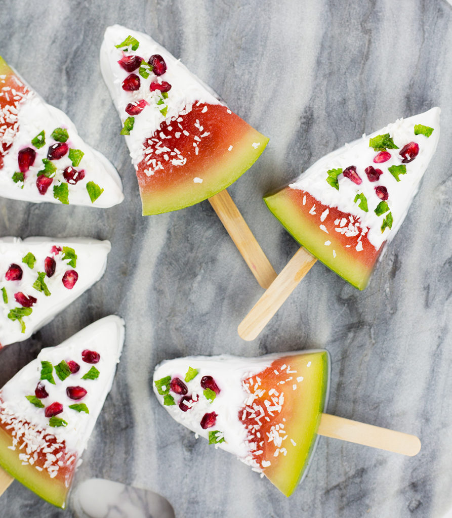 These watermelon coconut popsicles make a fun Christmas treat for the Kiwi or Australian summer. So easy to make, no added sugar or nasties, kids will love these fun and festive summer treats. Paleo, Vegan & Dairy Free. #paleorecipe #popsicles #watermelon #lowcarbrecipes #lowcarbdesserts #veganrecipes #sugarfreerecipes