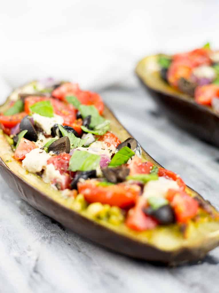 Close up of eggplant bruschetta on marble background