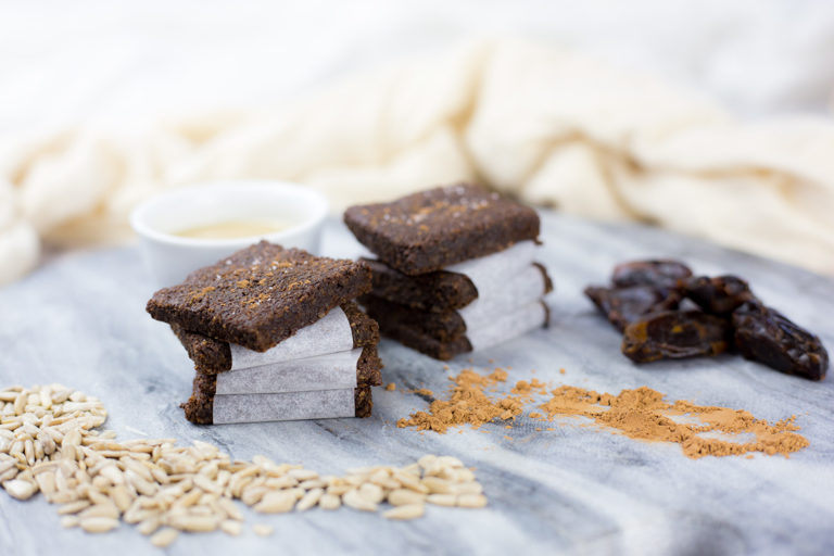 These Carob and Tahini Seed Bars make a healthy snack for kids or adults. Nut free, gluten & dairy Free with no added sugar. These healthy bars have a delicious flavour from the carob without the caffeine hit you can get from cacao or chocolate making them a great kids snack. #paleo #glutenfreerecipes #dairyfree #grainfree #nutfree #healthysnacks #lunchboxideas #allergyfriendly #healthykids
