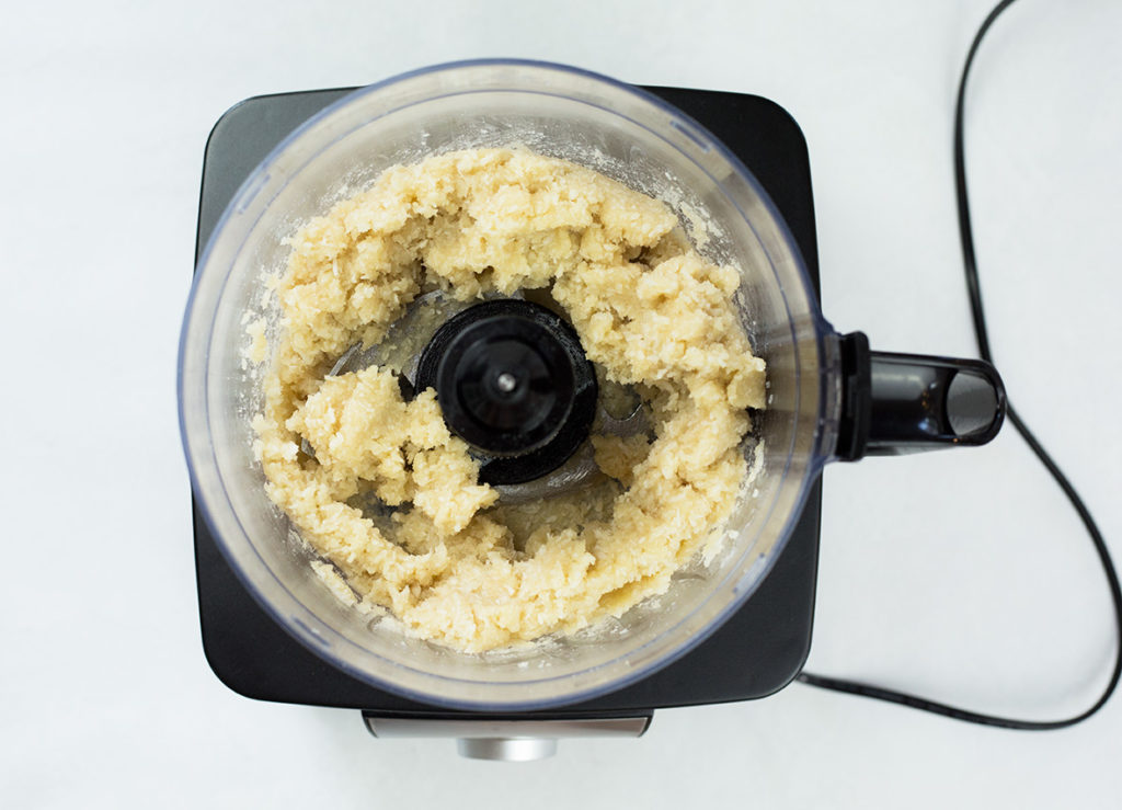 Dough in food processor for coconut almond snowballs