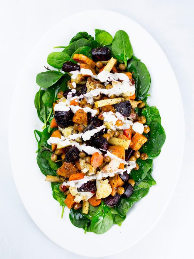 Roasted vegetable salad with lemon tahini dressing.