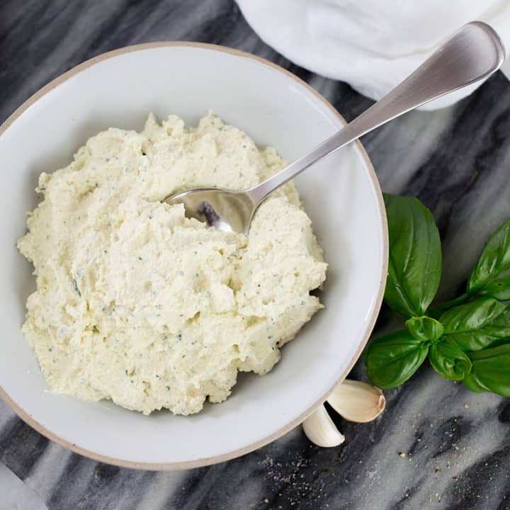 Dairy-Free Ricotta on marble background.