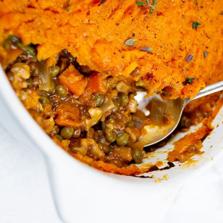 Vegan shepherds pie with spoon scooping some out.