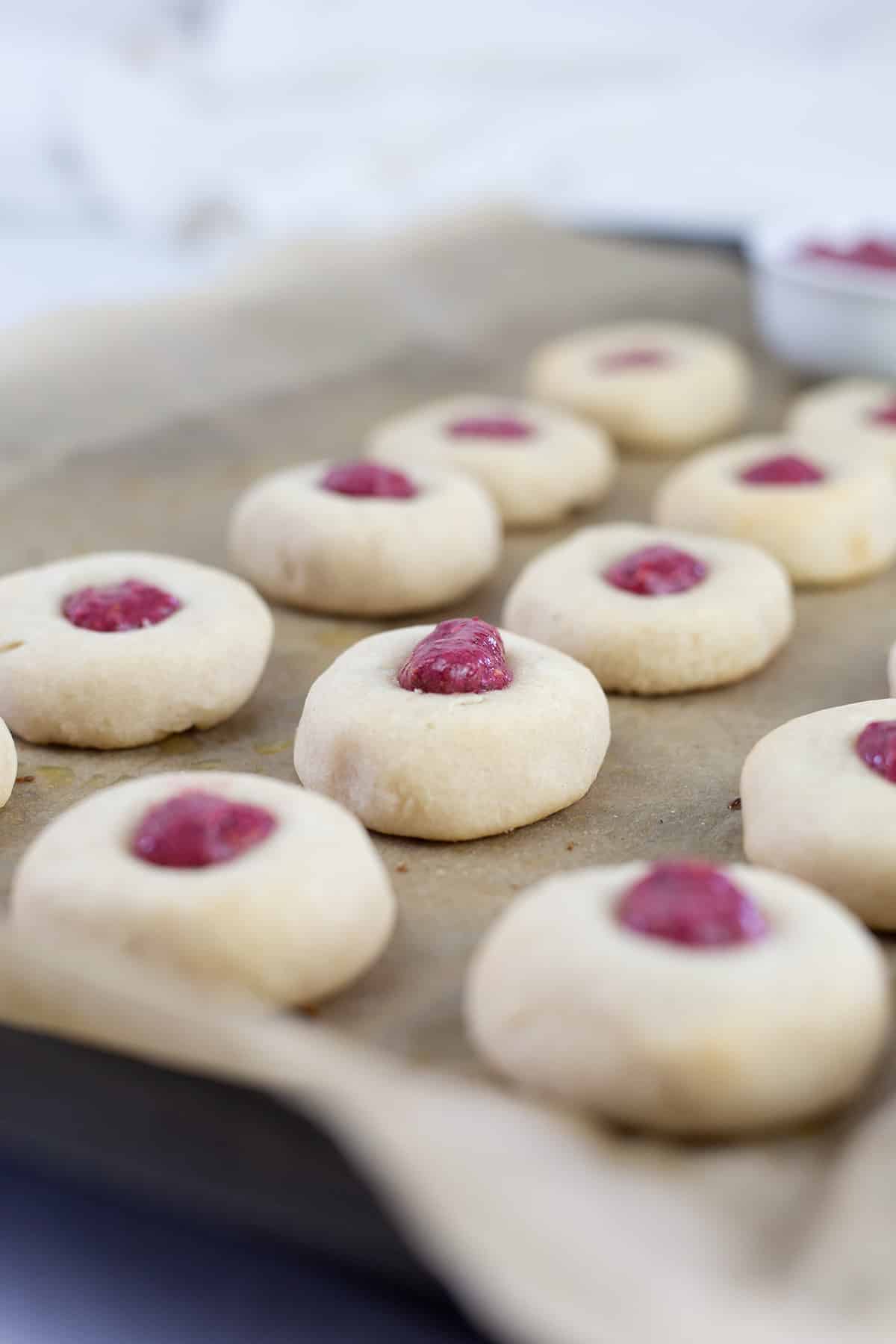 Thumprint cookies on a baking tray