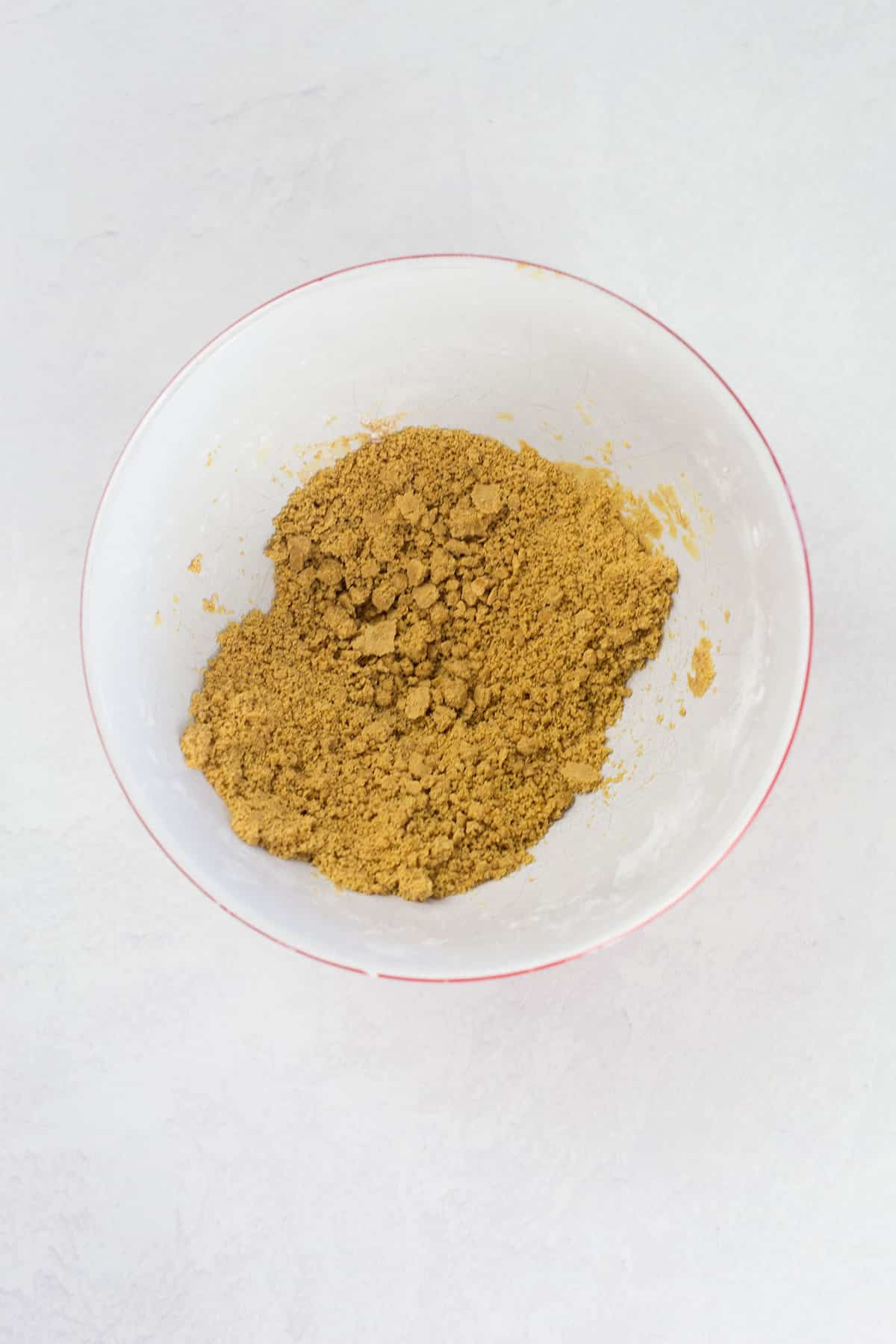 Crumbly mixture in bowl.