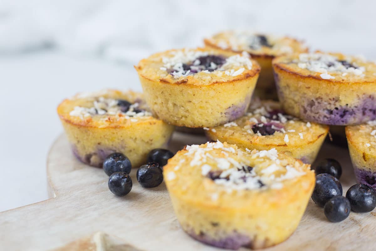 Blueberry lemon almond cakes stacked on board.