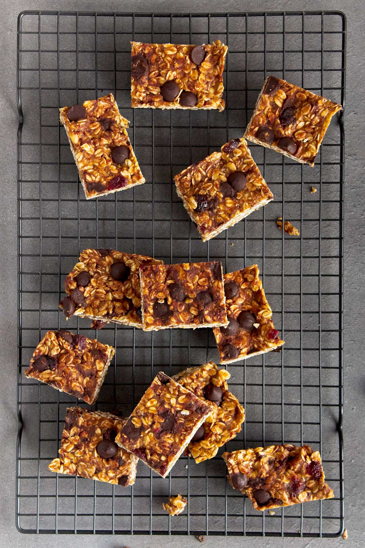 Chocolate Chip Oat Bars birdseye view spread out on cooling rack.