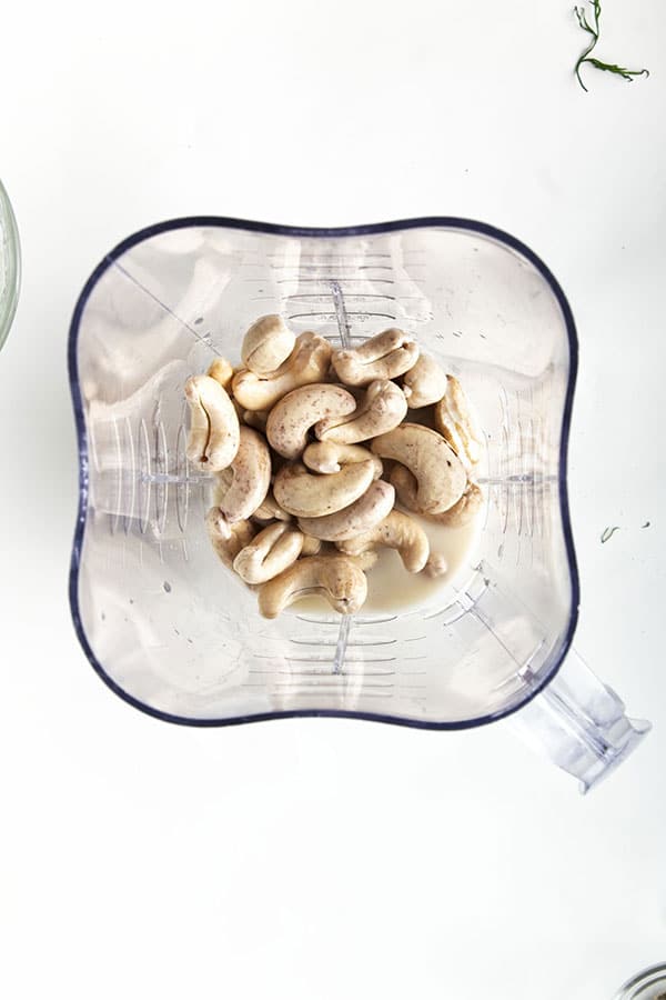 Cashews in the blender for dairy free ranch dressing.