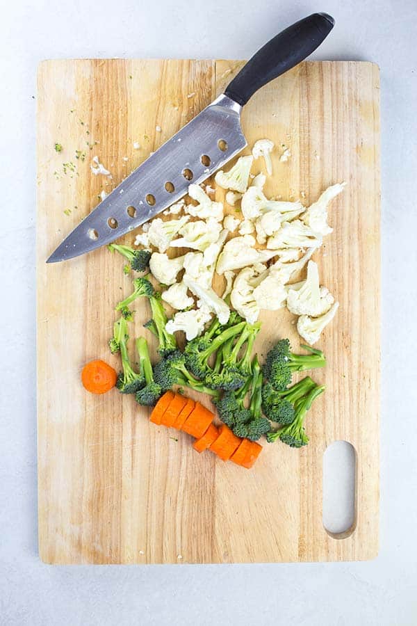 Chopped vegetables on board