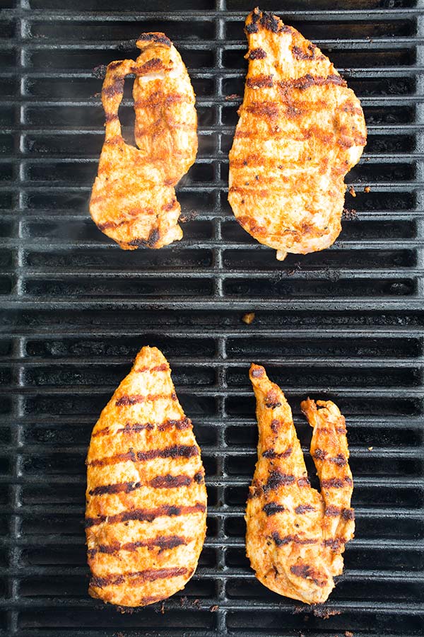 Mecian chicken grilling on bbq.