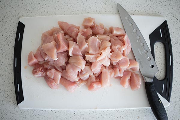 Chicken diced on board